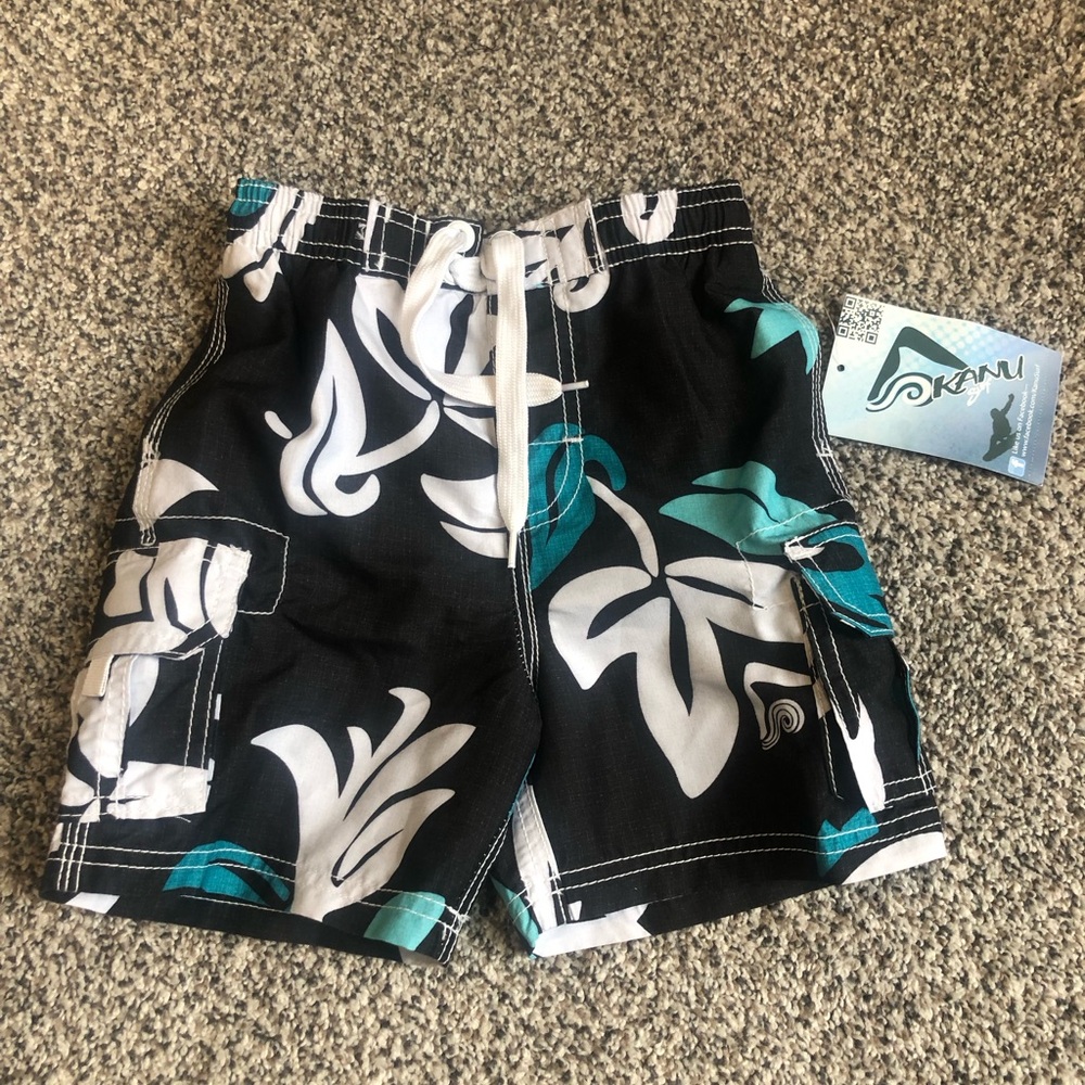 Kanu surf Boys Black Floral Swim Trunks with Teal Accents